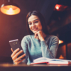 Surprised woman reading phone